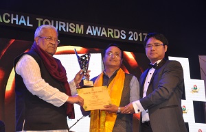 The Governor of Arunachal Pradesh Shri PB Acharya presenting awards on the   occasion of State Tourism Award function at IG Park Itanagar on 31st January2017.